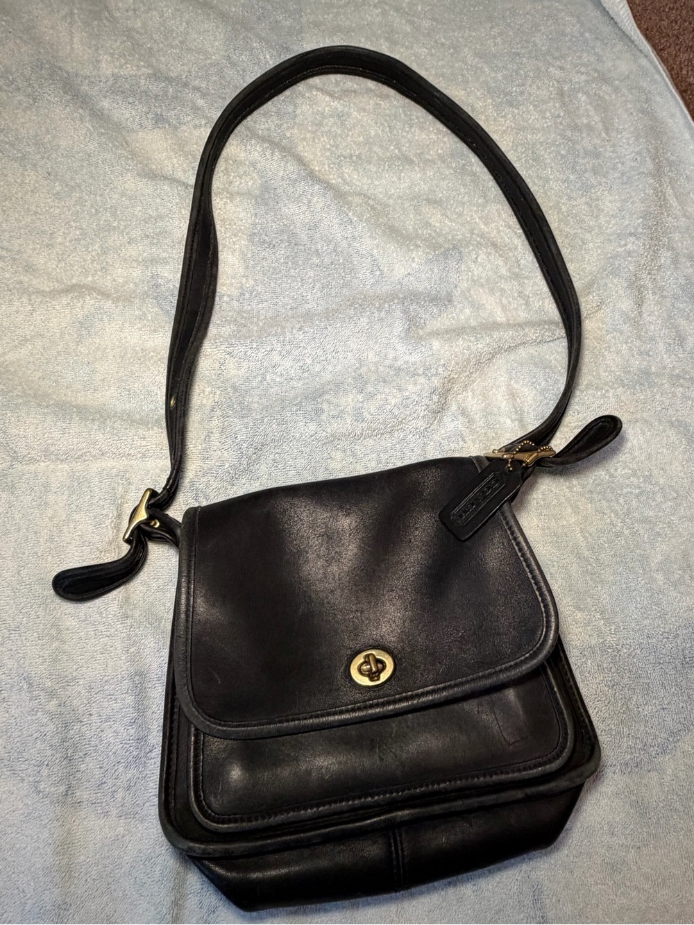 Coach Black Leather Shoulder Bag with Gold Turnlock Accent